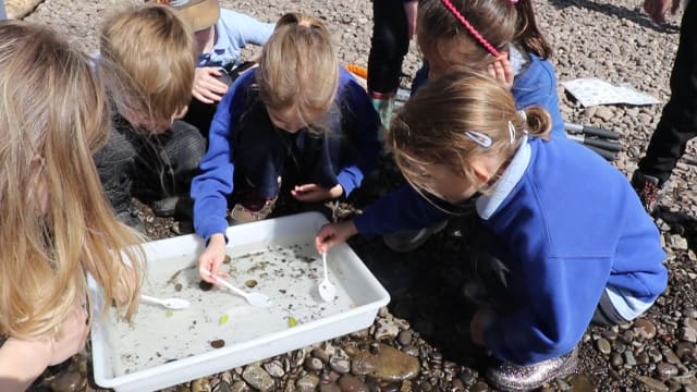 Pupils from Llanfoist Fawr Primary School at the Freshwater Friends appeal launch, discovering what lives in the river Usk and why clean water is so important to them.